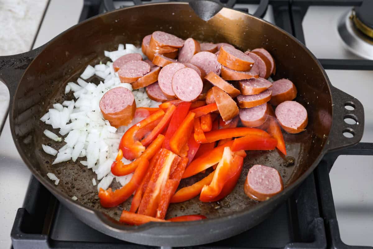 Fourth photo of the sausage, peppers, and onions cooking.