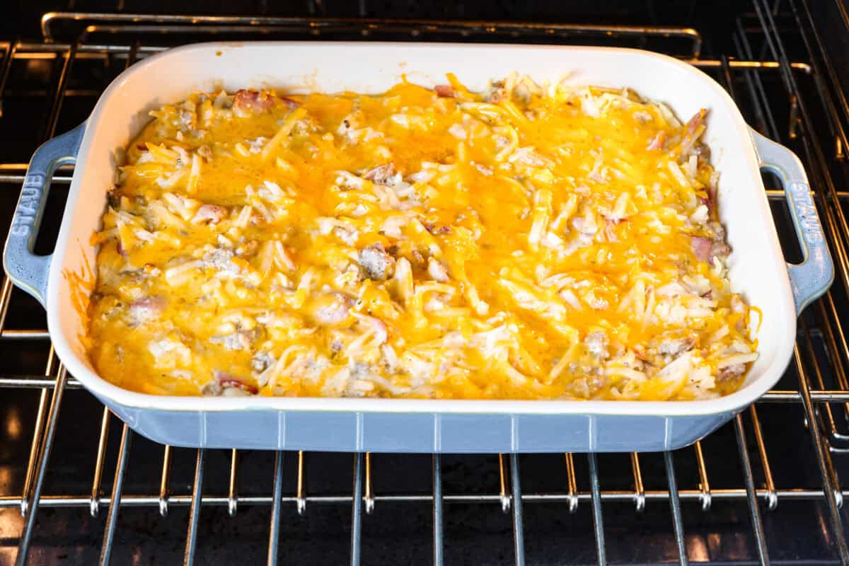 Angle shot of crack breakfast casserole being baked in the oven.