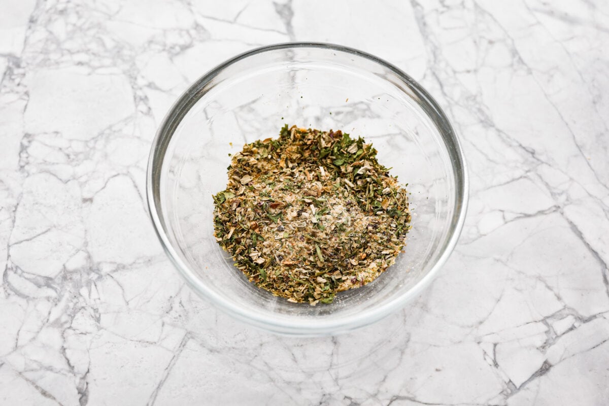 Overhead shot of the herbs and spices mixed in a bowl.