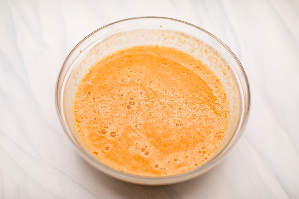 Overhead shot of all the ingredients whisked together in a mixing bowl. 