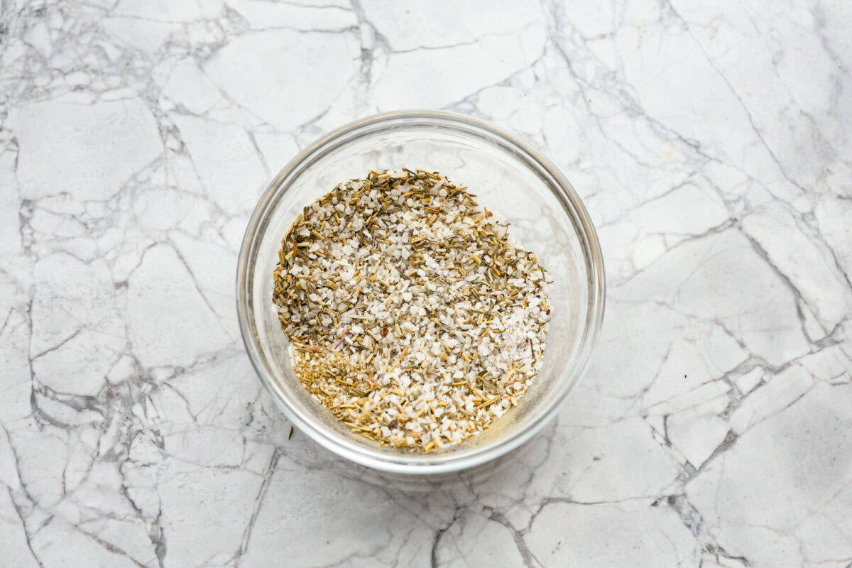 Overhead shot of salt and seasonings mixed together in a bowl. 