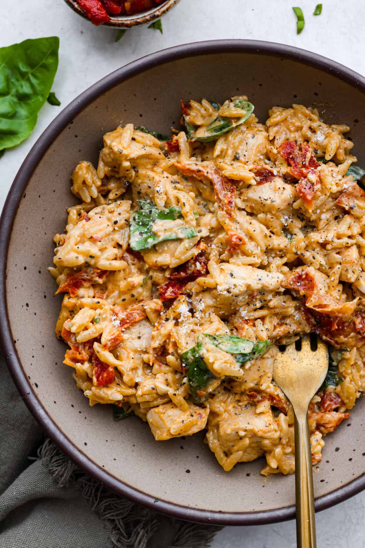 Overhead shot of plated marry me chicken orzo. 