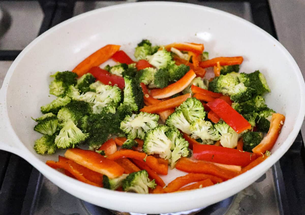 Third photo of the veggies cooking in the skillet.