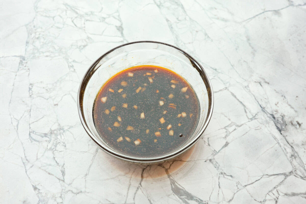 overhead shot of marinade ingredients in a bowl. 