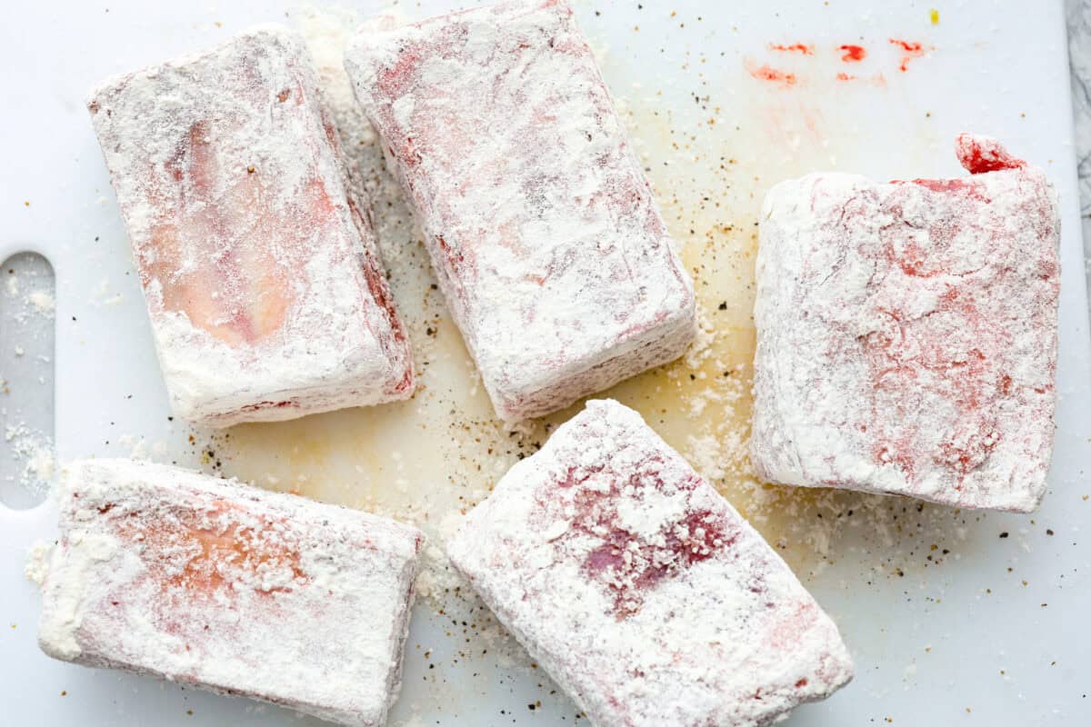 Second photo of the short ribs coated in flour.