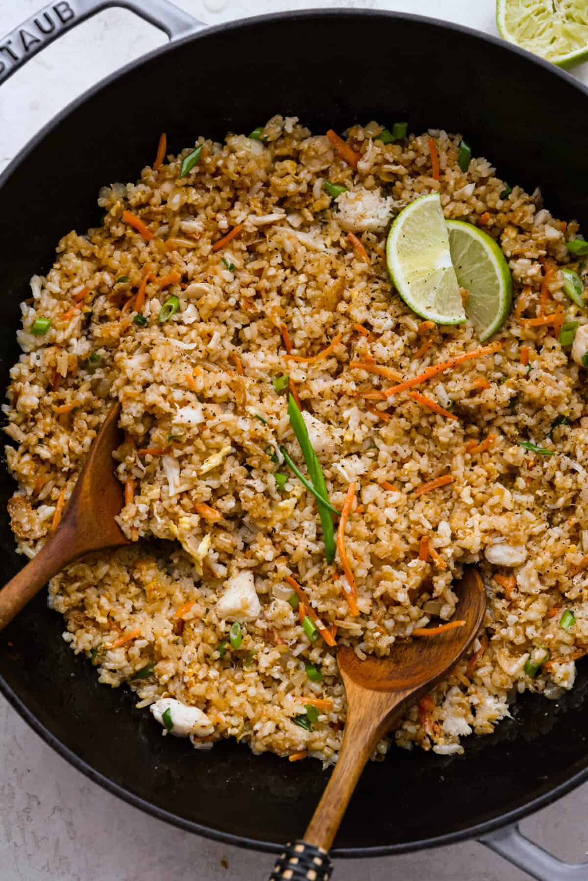 Overhead shot of crab fried rice in a wok. 