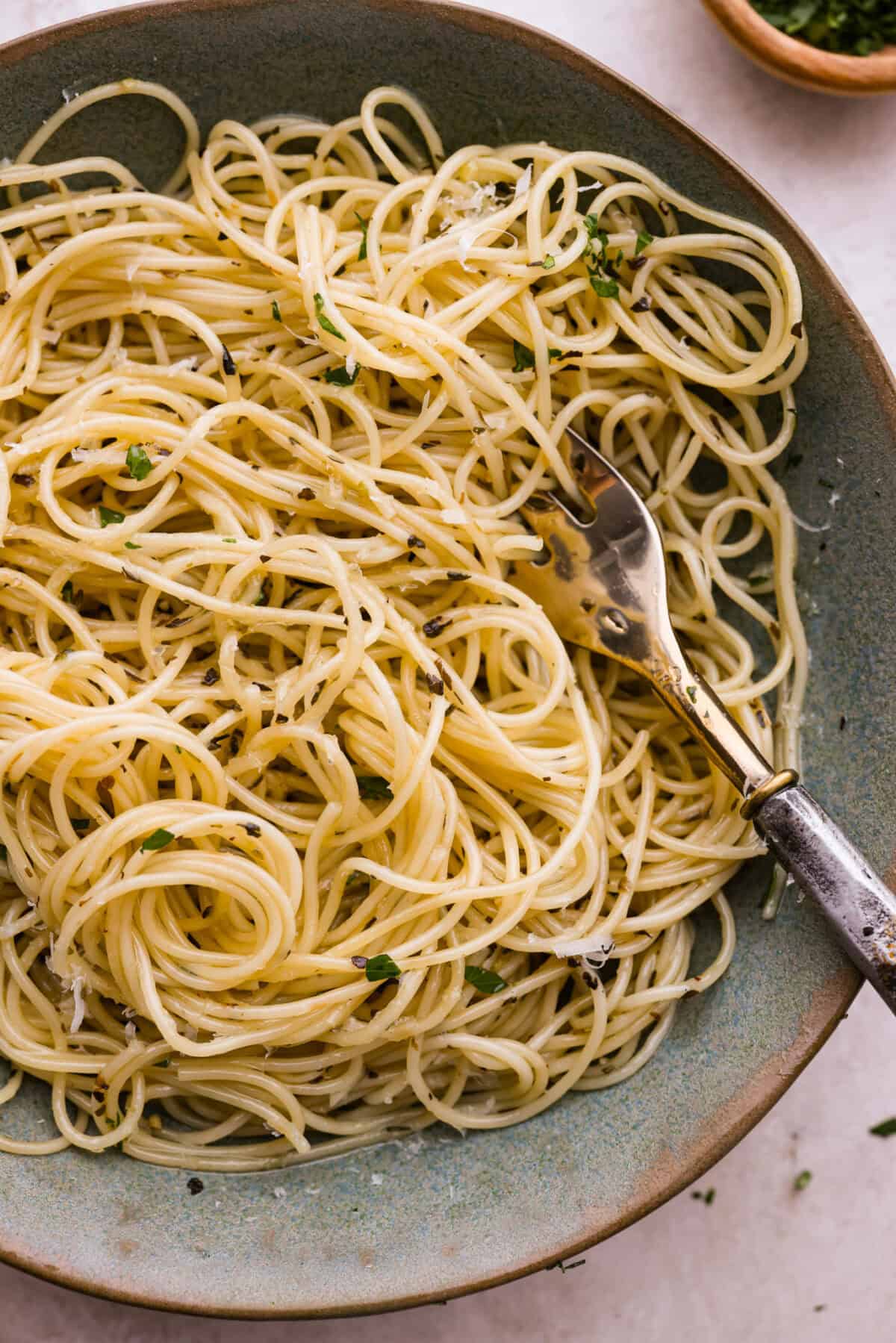 Close up shot of plated garlic butter pasta.