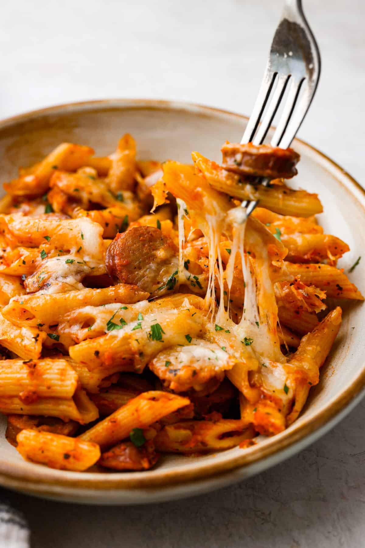 Close up shot of plated Italian sausage casserole. 