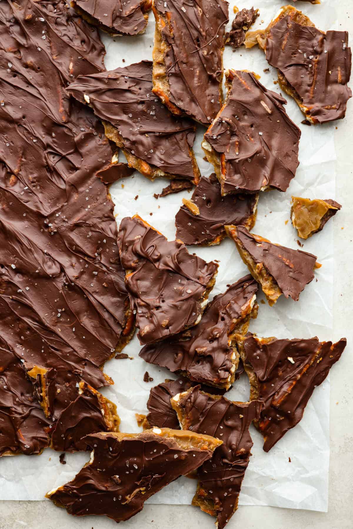 Overhead shot of broken up pieces of pretzel Christmas crack. 