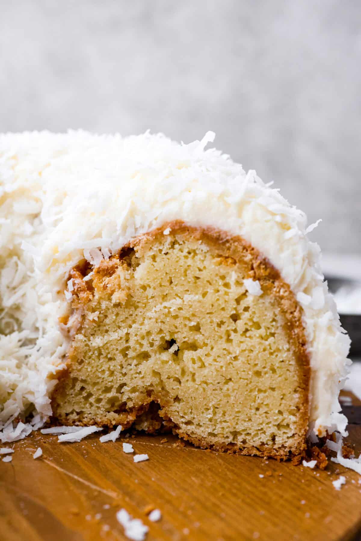 Side shot of the side of Tom Cruise coconut cake cut. 