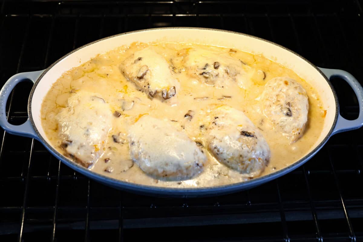 Angle shot of gloria chicken baking in the oven. 