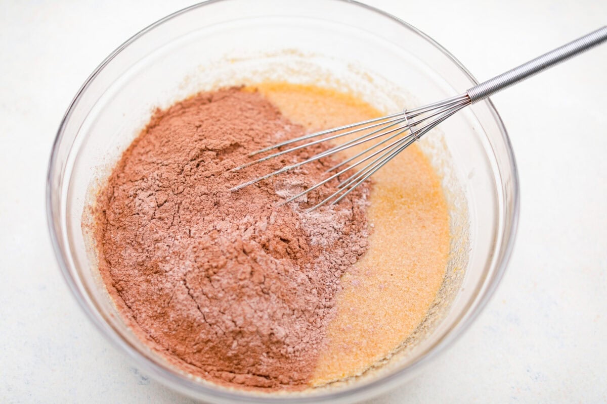 Overhead shot of the whisked wet and dry ingredients together in a bowl.