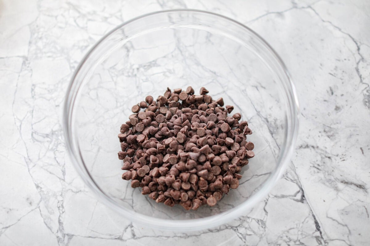 Overhead shot of chocolate chips in a bowl. 