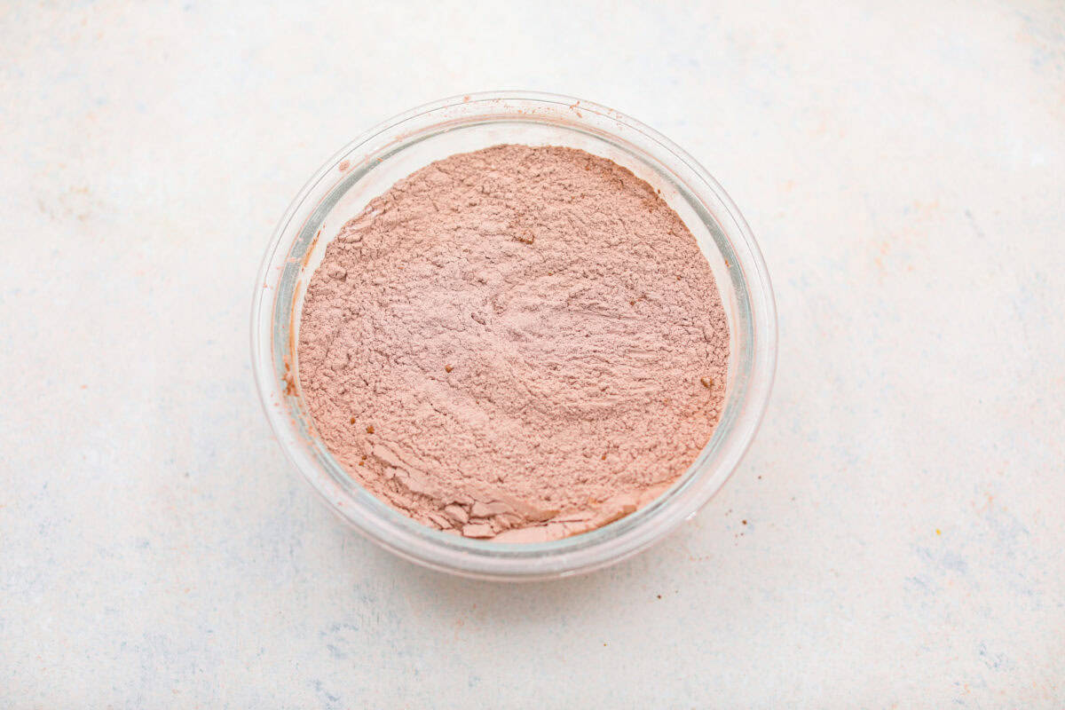 Dry ingredients mixed together in a mixing bowl.