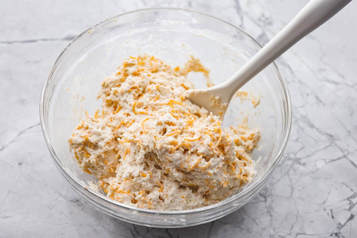 A mixing bowl with the wet and dry ingredients combined.