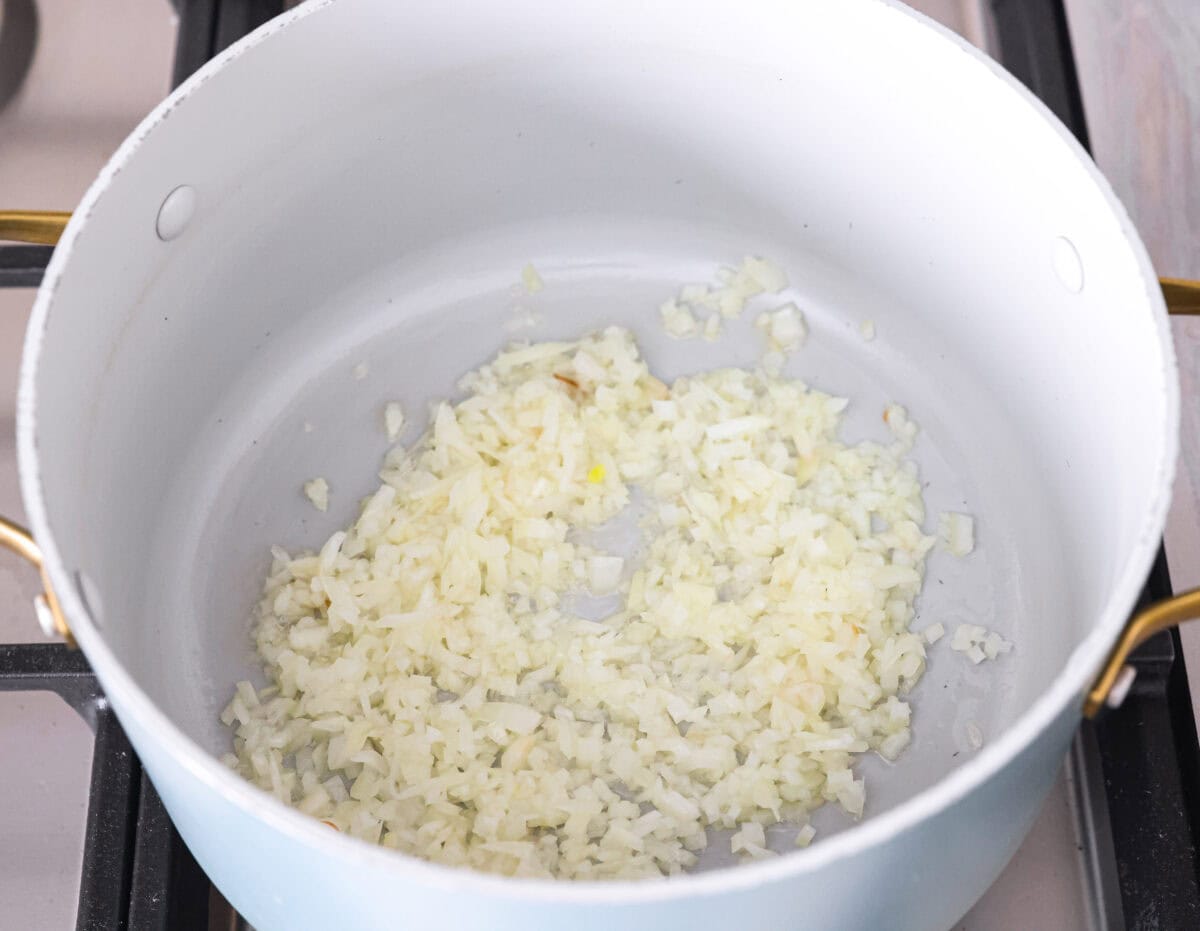 Pot of sautéing onions.