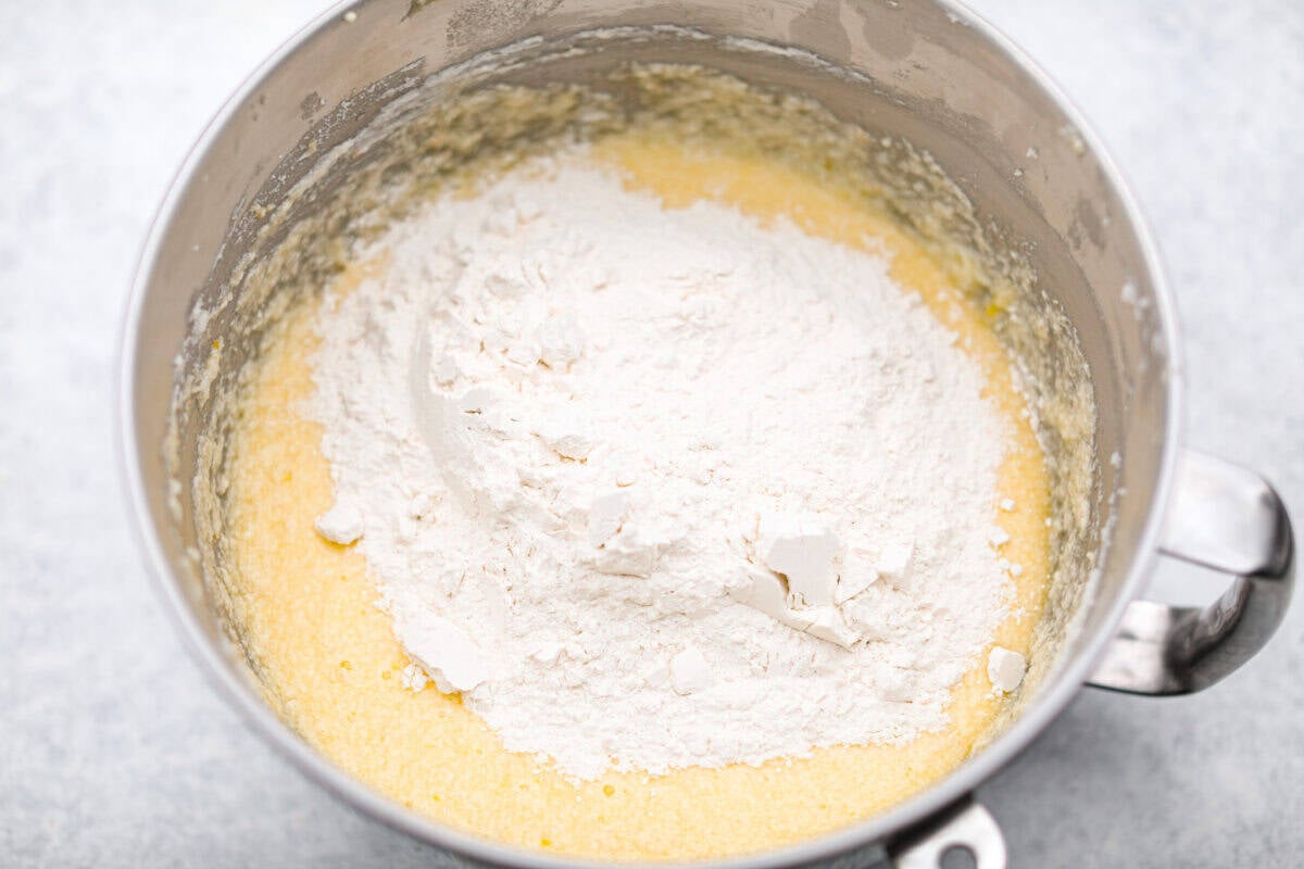 Dry ingredients added to the bowl of wet ingredients.