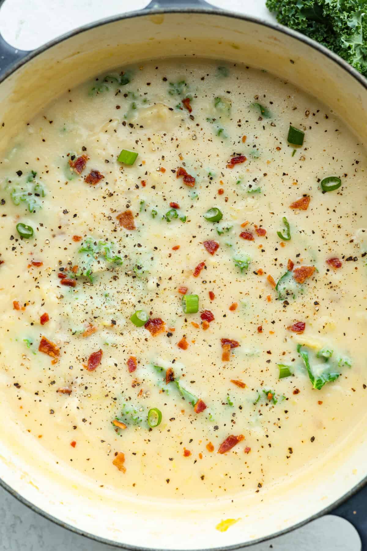 Overhead shot of colcannon soup in a pot. 