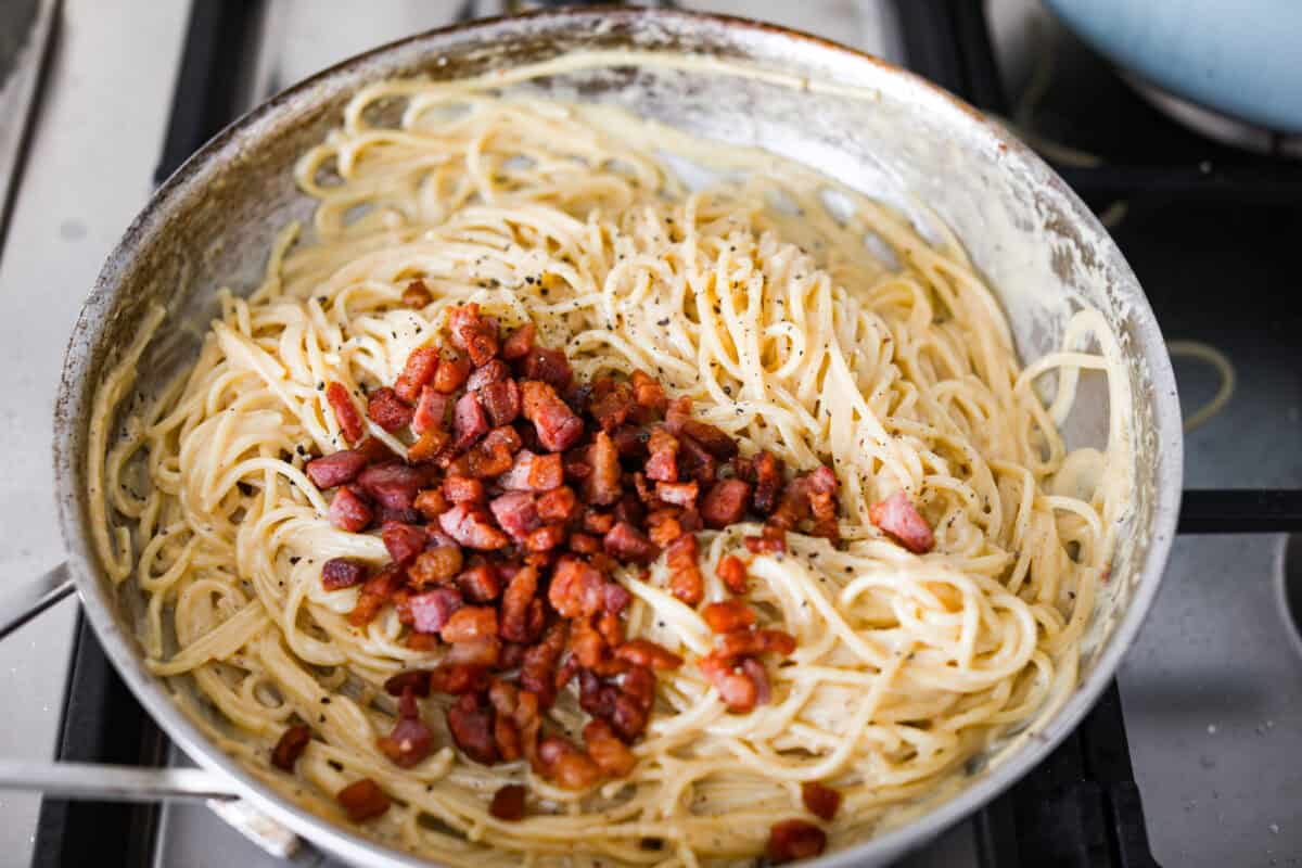 Cooked pancetta over the pasta carbonara. 