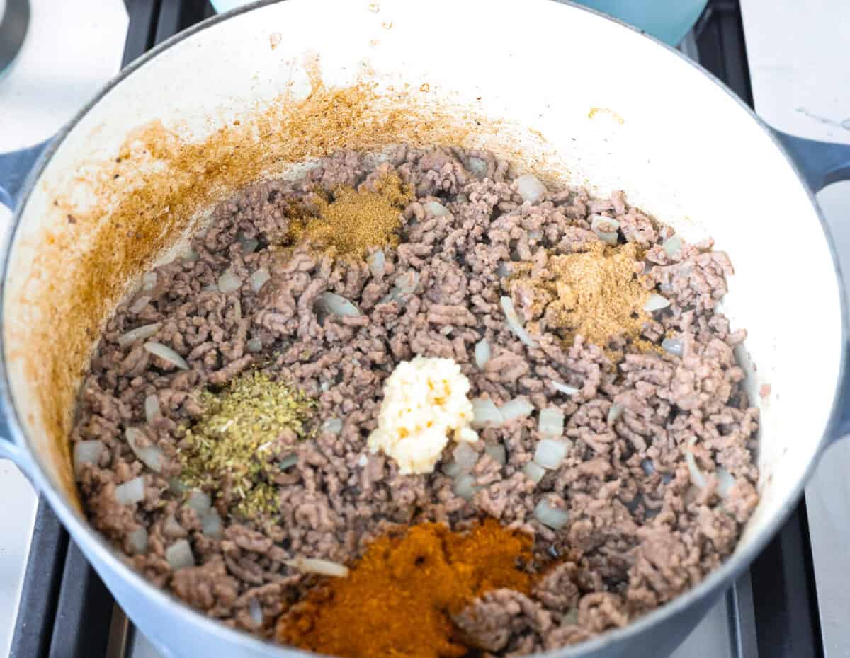 Not to be dramatic, but Frito Chili Pie might have saved my sanity. Zero whining, zero leftovers, it was a total dinner miracle. Crunchy, flavorful and ridiculously easy... you need this in your life ASAP. Seasonings added to the cooked ground beef.