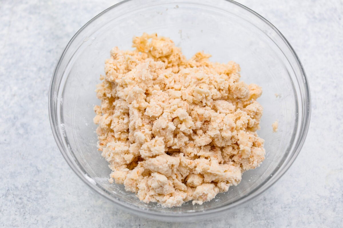 My Dad LOVES coconut cream pie! When I don't have it in me to make a pie, I make this easy Coconut Lush dessert! It’s rich, dreamy, and always the first dessert to disappear at family gatherings. Crust ingredients mixed together.