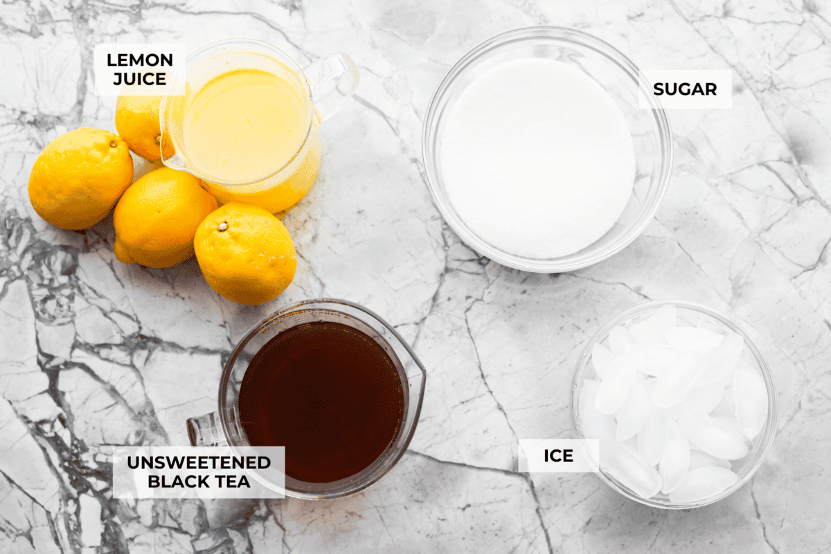If you love iced tea, you’re going to be obsessed with this Arnold Palmer. The combo of crisp black tea and tangy lemonade is pure summer magic. It’s simple, refreshing, and always just what you need. Overhead shot of labeled ingredients.