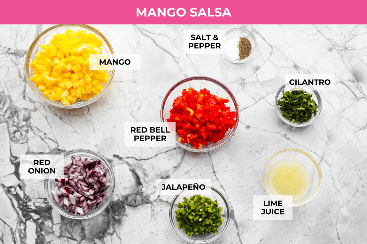 I'm obsessed with salmon, and this Mango Salsa Salmon might be my new favorite! It’s quick, flavorful, and my kids will actually eat it! The fresh salsa is so good! Overhead shot of mango salsa ingredients.