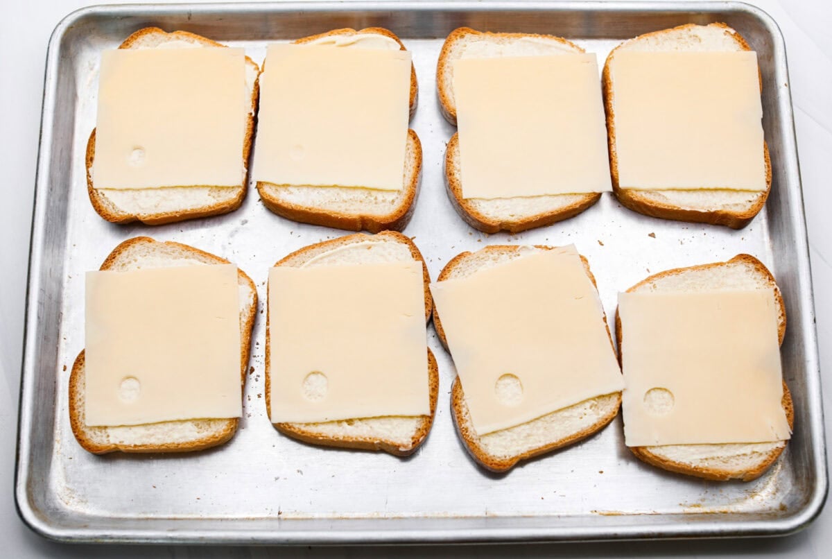 Swiss cheese added to each slice of bread. 