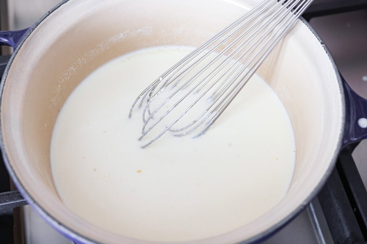 Craving something cozy, cheesy, and totally irresistible? My four cheese pasta brings comfort with a creamy ricotta base and a melty mix of easy-to-find Italian cheeses. It’s indulgent and totally hits the flavor jackpot! Heavy cream, pasta liquid, and ricotta cheese added to the pan with the olive oil and garlic.