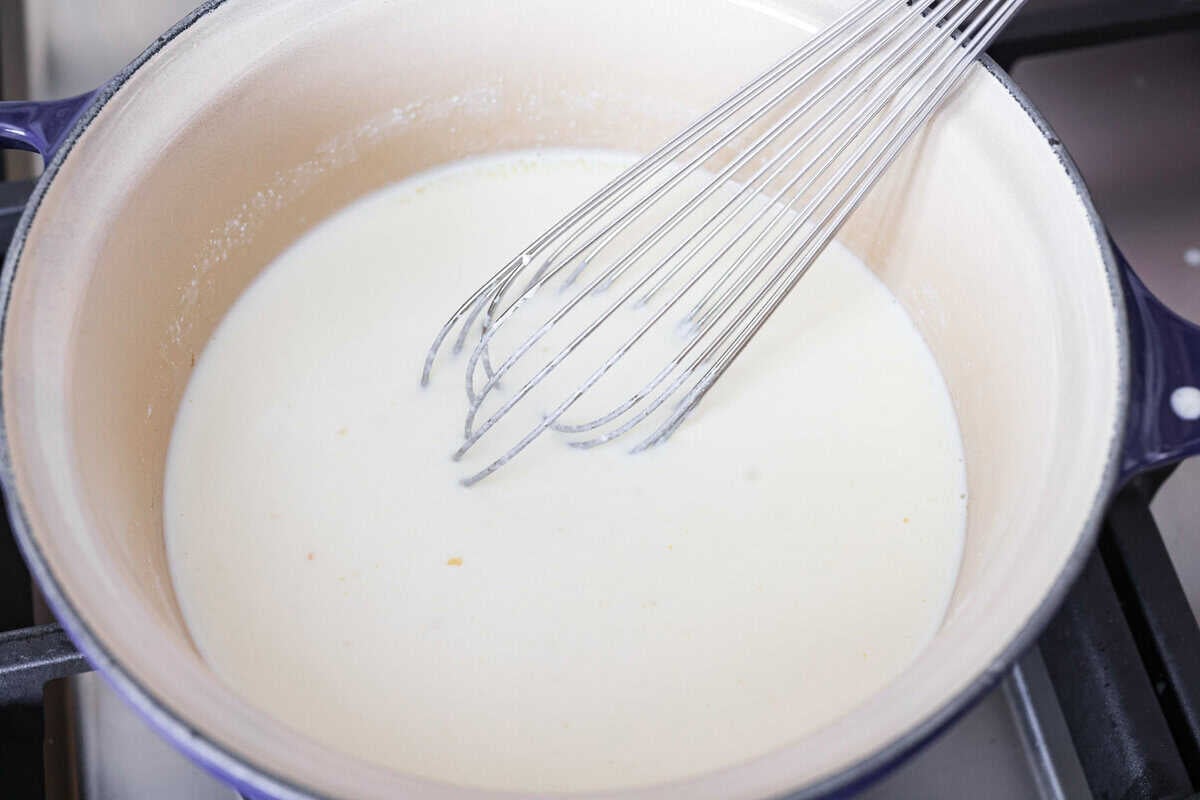 Craving something cozy, cheesy, and totally irresistible? My four cheese pasta brings comfort with a creamy ricotta base and a melty mix of easy-to-find Italian cheeses. It’s indulgent and totally hits the flavor jackpot! Heavy cream, pasta liquid, and ricotta cheese added to the pan with the olive oil and garlic.
