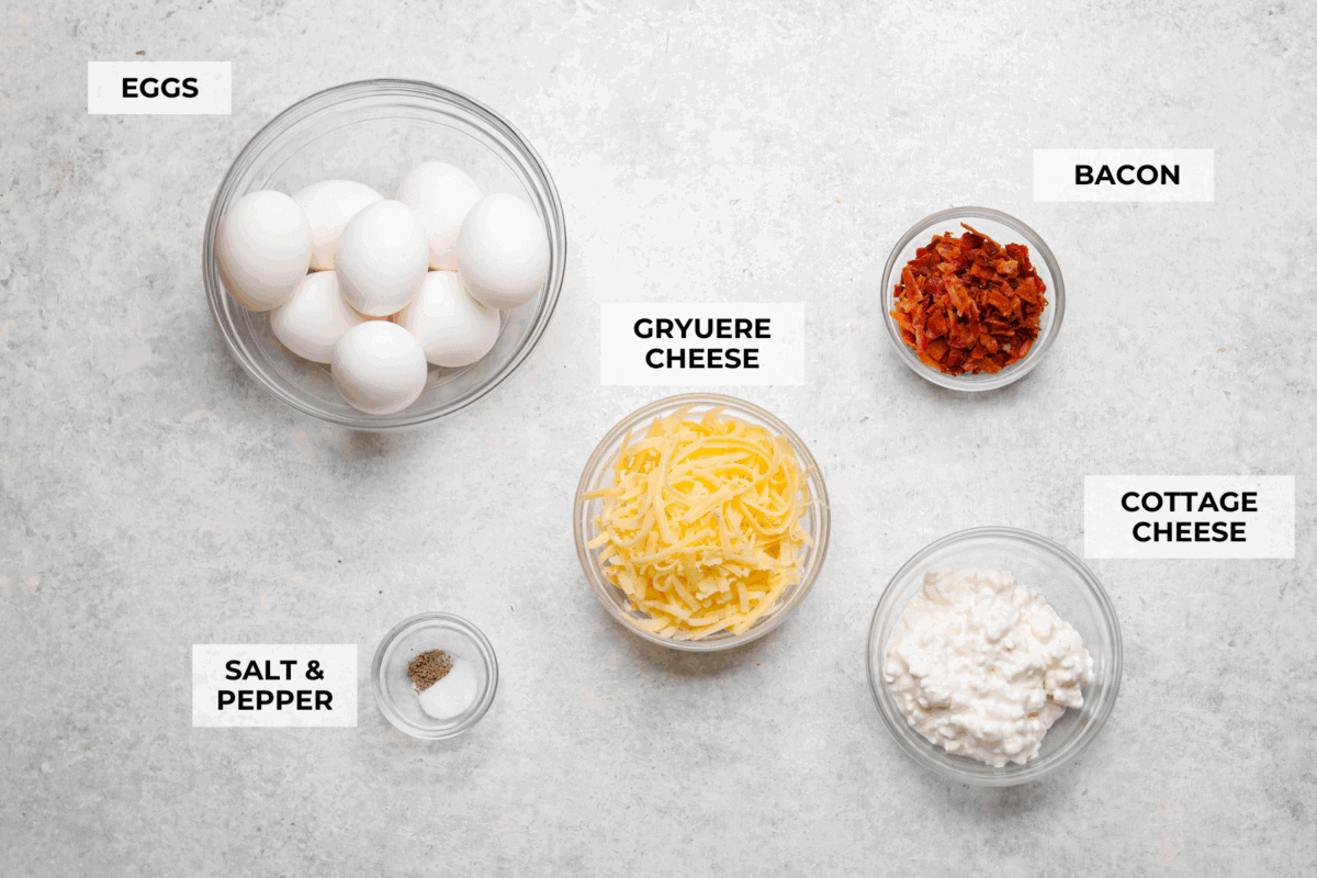 I’ve been hooked on Starbucks egg bites for years, but not the price! This homemade version is just as fluffy and flavorful, and makes the perfect grab-and-go, protein-packed breakfast. Overhead shot of labeled ingredients.