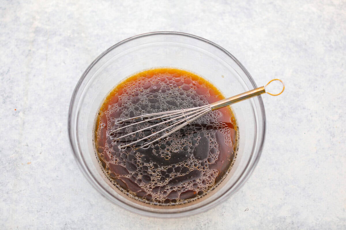 Sauce ingredients whisked together in a bowl. 