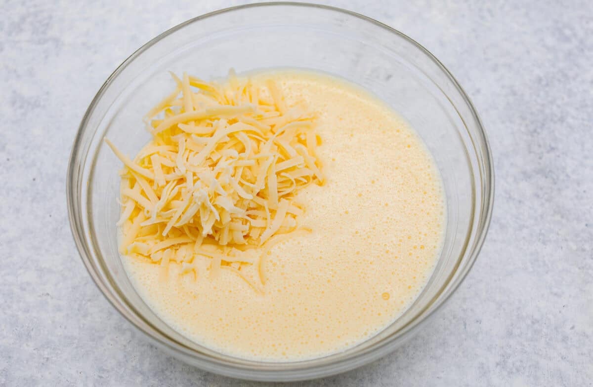 I’ve been hooked on Starbucks egg bites for years, but not the price! This homemade version is just as fluffy and flavorful, and makes the perfect grab-and-go, protein-packed breakfast. Cheese added to the egg and cottage cheese mixture.