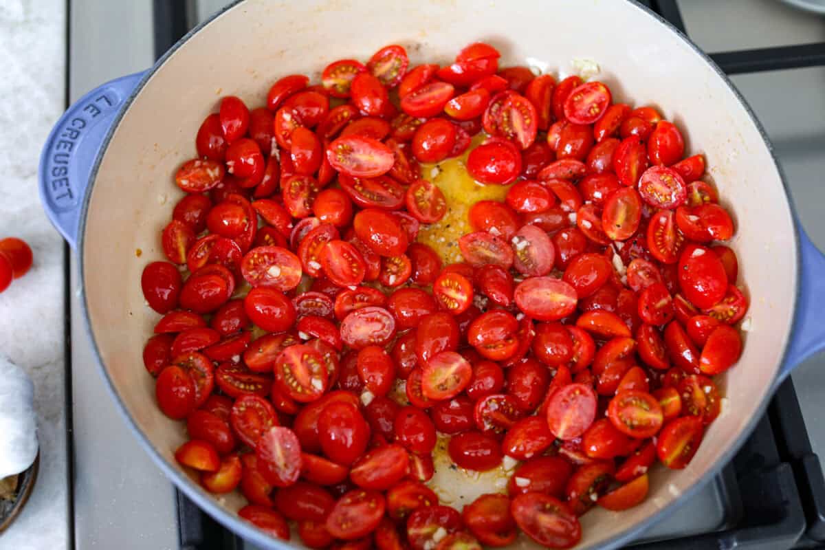 Spaghetti Margherita has been a family favorite since I was a kid, though we just called it “pasta with tomato and basil.” It’s simple, fresh, and so full of flavor, even my meat-loving husband can’t get enough! Cherry tomatoes cooking in olive oil and garlic.