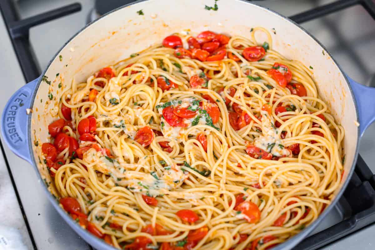 Spaghetti Margherita has been a family favorite since I was a kid, though we just called it “pasta with tomato and basil.” It’s simple, fresh, and so full of flavor, even my meat-loving husband can’t get enough! Cheese and all ingredients stirred together in the skillet.