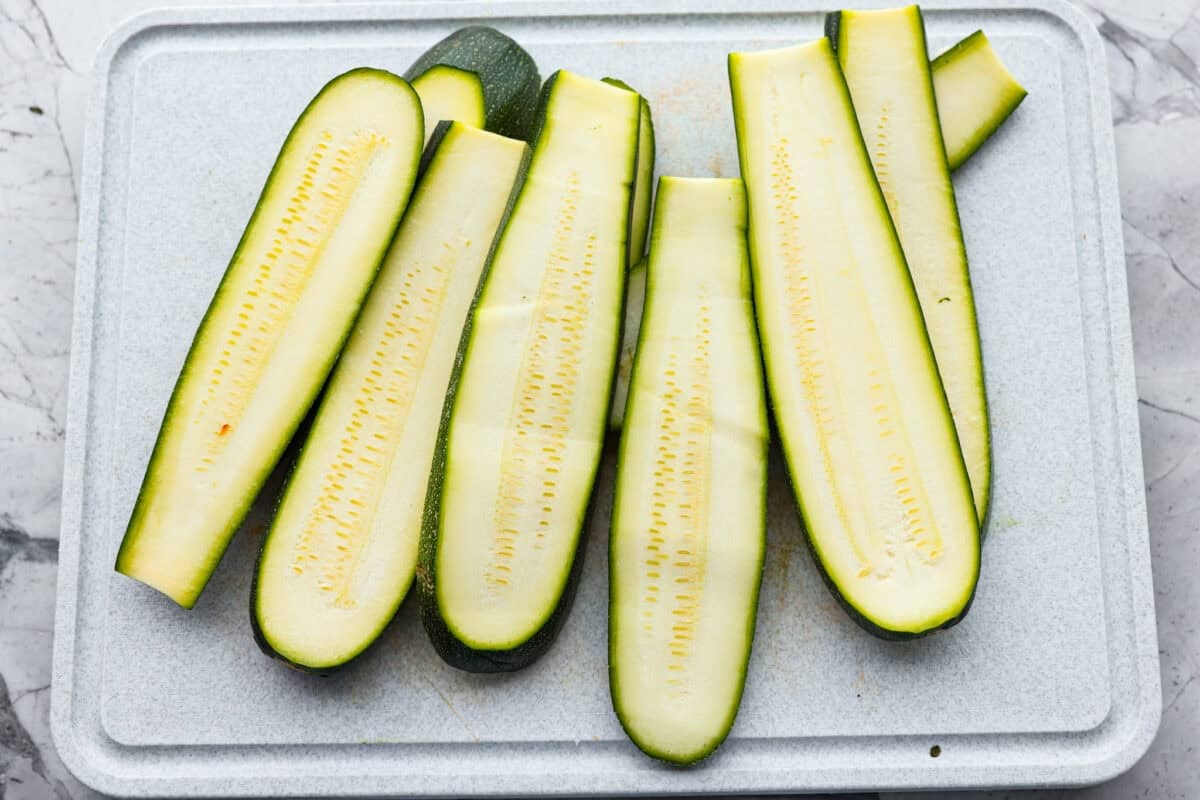 ZUcchini sliced on a cutting board. 