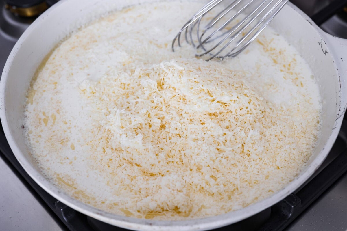 They don’t call it Marry Me Lasagna for nothing! One bite of the creamy sauce, tender chicken, and melty cheese, and everyone will be saying, "YES!" Chicken broth, heavy cream and grated parmesan cheese added to the roux to make the cream sauce.
