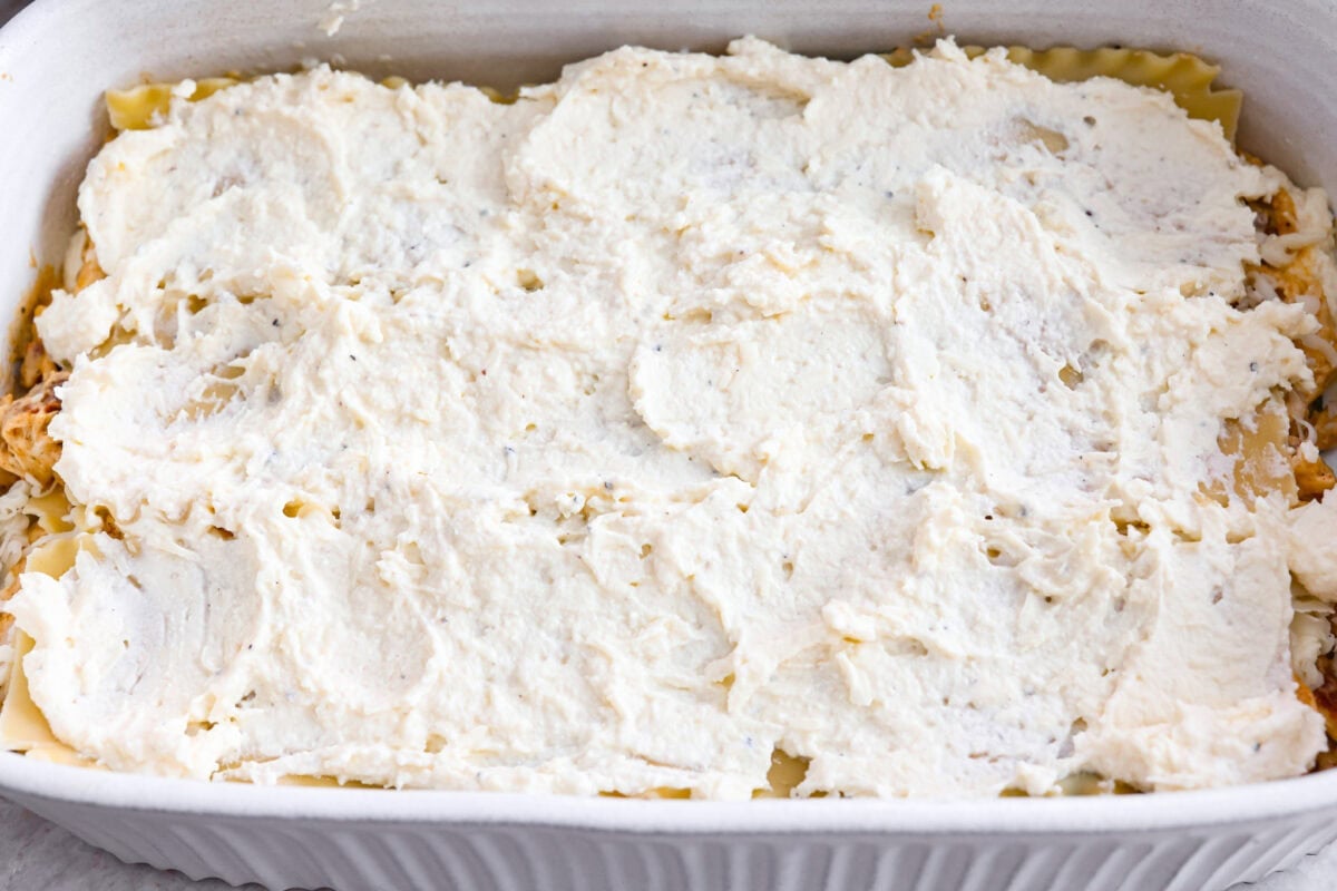 They don’t call it Marry Me Lasagna for nothing! One bite of the creamy sauce, tender chicken, and melty cheese, and everyone will be saying, "YES!" Ricotta cheese layer on top of the noodles.