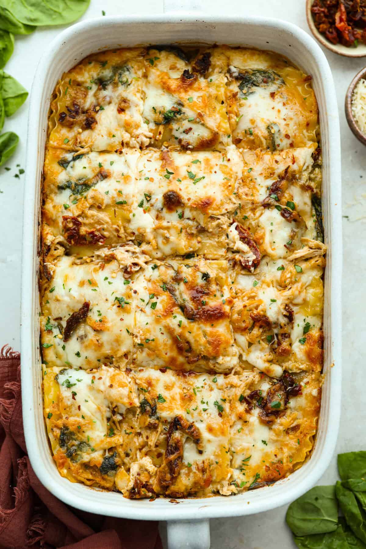 They don’t call it Marry Me Lasagna for nothing! One bite of the creamy sauce, tender chicken, and melty cheese, and everyone will be saying, "YES!" Overhead shot of marry me lasagna cooked and ready to be eaten.