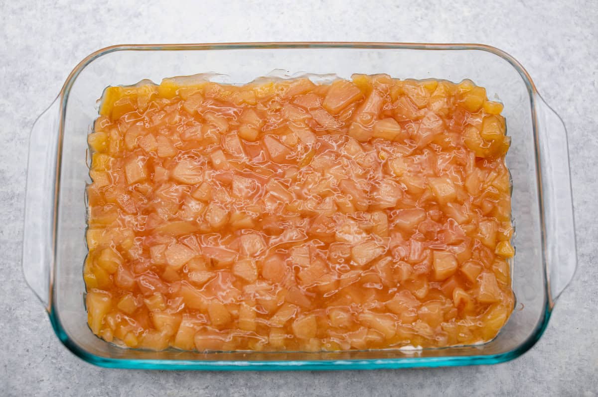 Caramel Apple Pie Lush is the easiest fall dessert you’ll ever make! With layers of buttery crust, creamy cheesecake, spiced apples, caramel, and whipped topping, it’s a yummy fall treat that is so much easier than baking a pie from scratch! Apple pie filing layer aded to the top of the cream cheese layer.