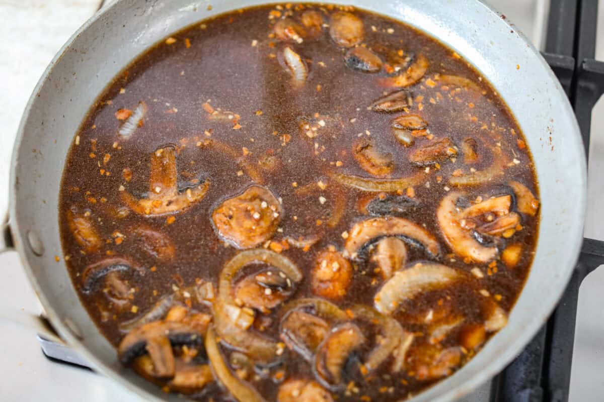 Cube steaks are my go-to budget comfort food. They're quick, cozy, and smothered in gravy. I love them with mashed potatoes or veggies, and I’ve got a simple trick to keep them melt-in-your-mouth tender every time. Gravy ingredients added to the onions and mushrooms.