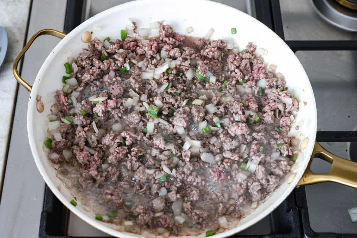 Beef, onions, and jalapeños.