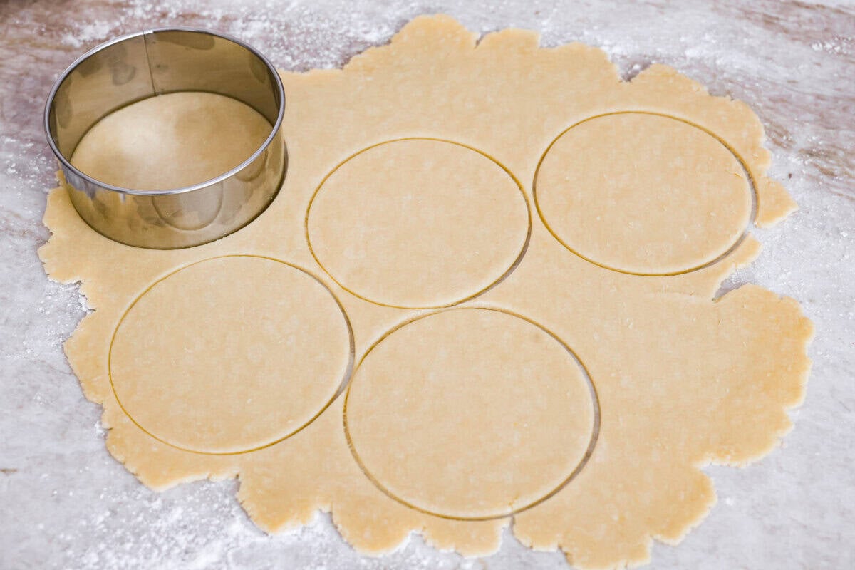 Empanada dough rolled out and cut into circles. 