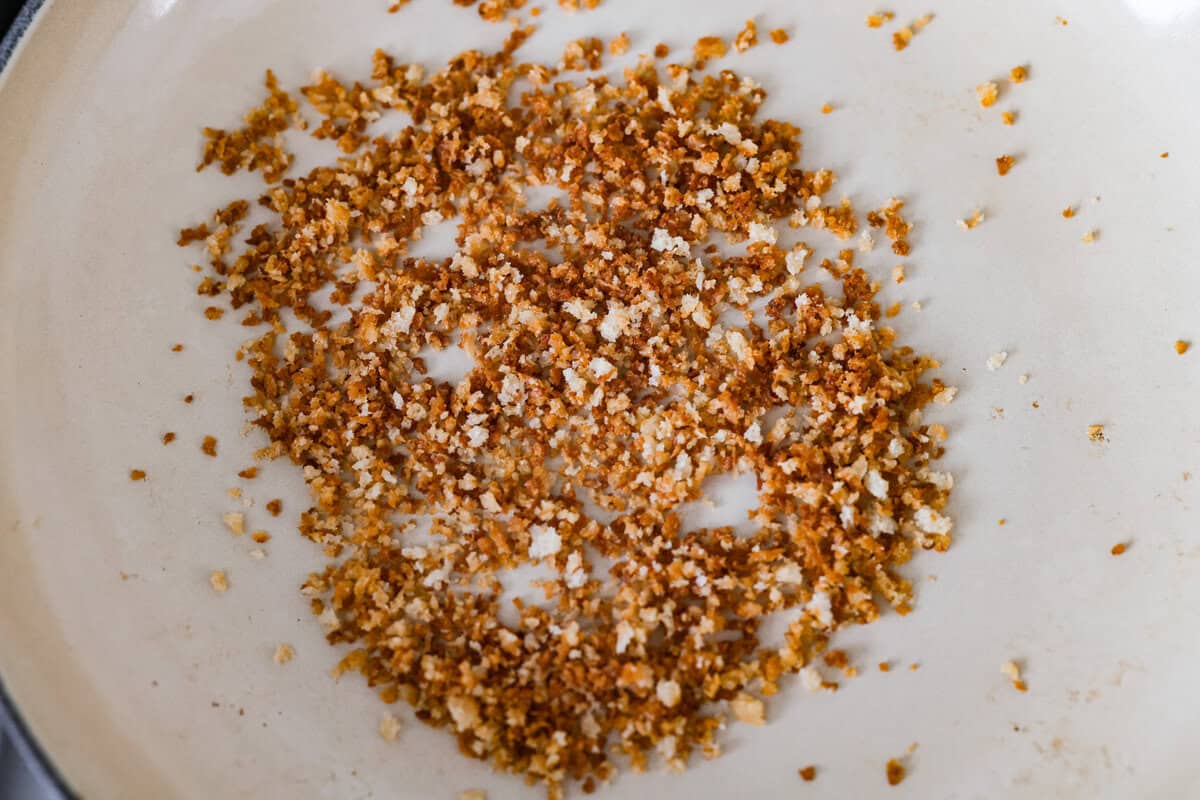 Meet my Fried Pickle Dip...a viral take on my popular pickle dip! The toasted bread crumbs elevate the flavors with the crunchy Panko bread crumbs browning in a pan with. butter.