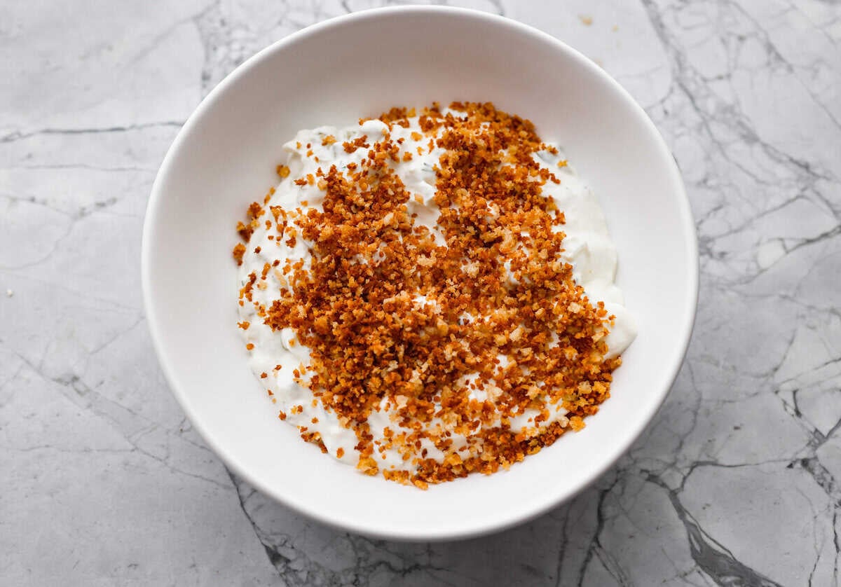 Meet my Fried Pickle Dip...a viral take on my popular pickle dip! The toasted bread crumbs elevate the flavors with the crunchy Crispy breadcrumbs added to the top of the dip.