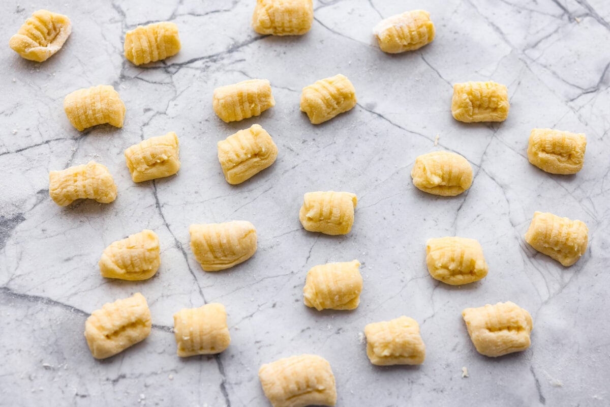 Bite sized pieces of homemade potato gnocchi dough. 