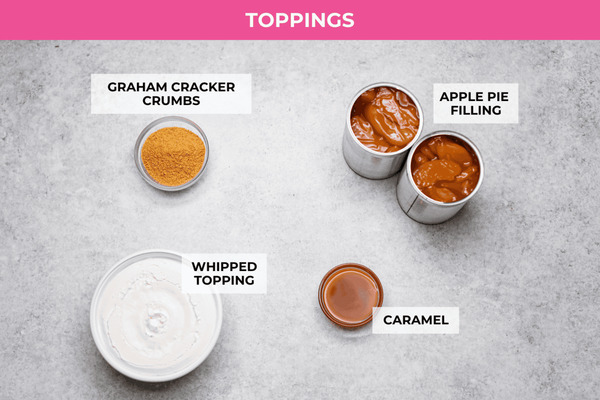 Caramel Apple Pie Lush is the easiest fall dessert you’ll ever make! With layers of buttery crust, creamy cheesecake, spiced apples, caramel, and whipped topping, it’s a yummy fall treat that is so much easier than baking a pie from scratch! Overhead shot of the labeled ingredients for the topping layer.