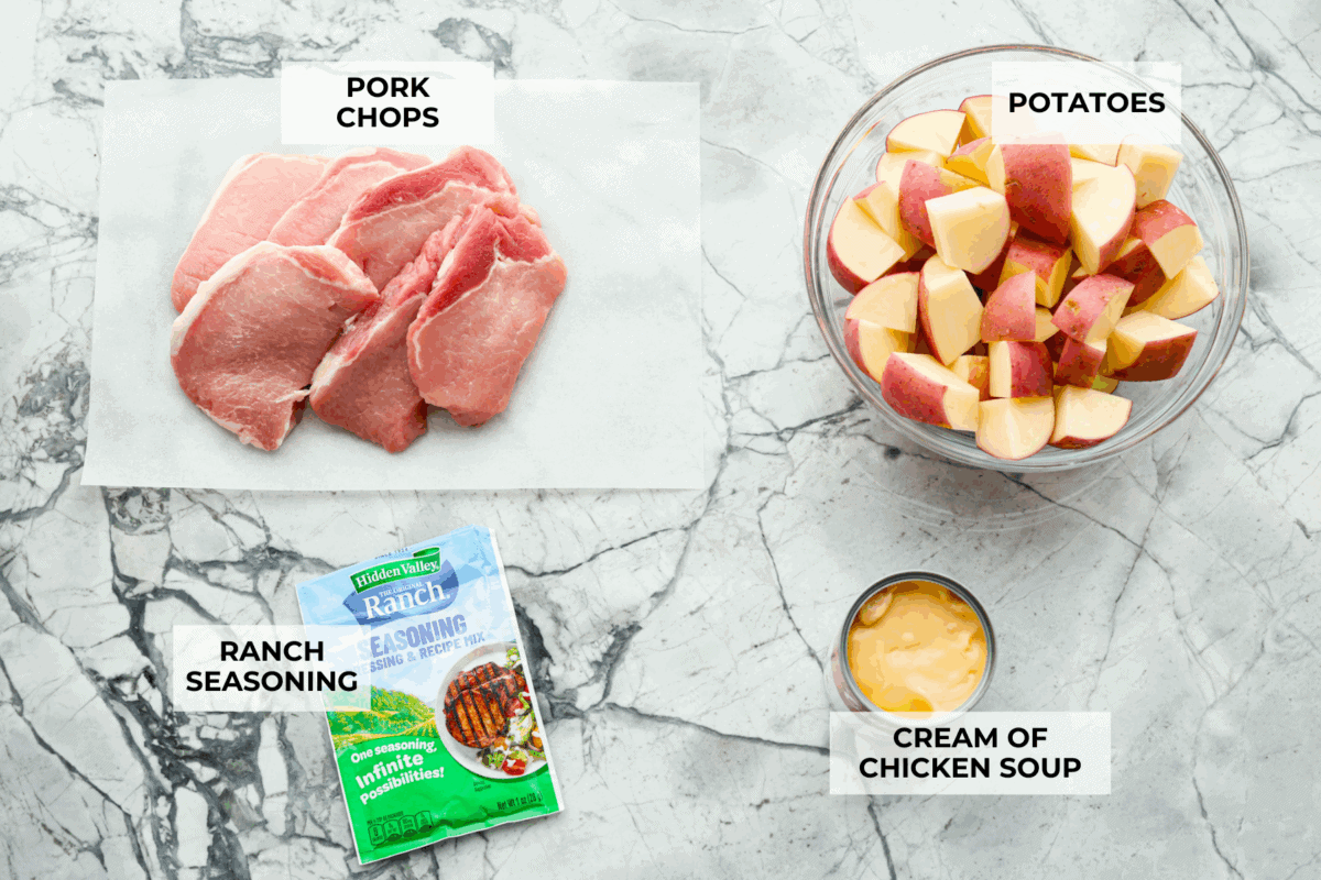 Overhead shot of labeled slow cooker ranch pork chops ingredients. 