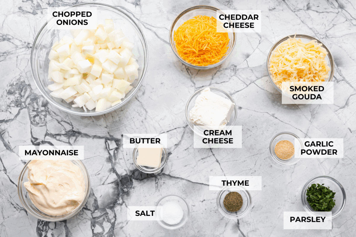 My Tennessee Onion Dip is a family-party legend. Everyone always begs me to bring it, and for good reason, the sweet onion flavor baked with gooey cheese and seasonings is absolutely irresistible! Overhead shot of labeled Tennessee onion dip ingredients.