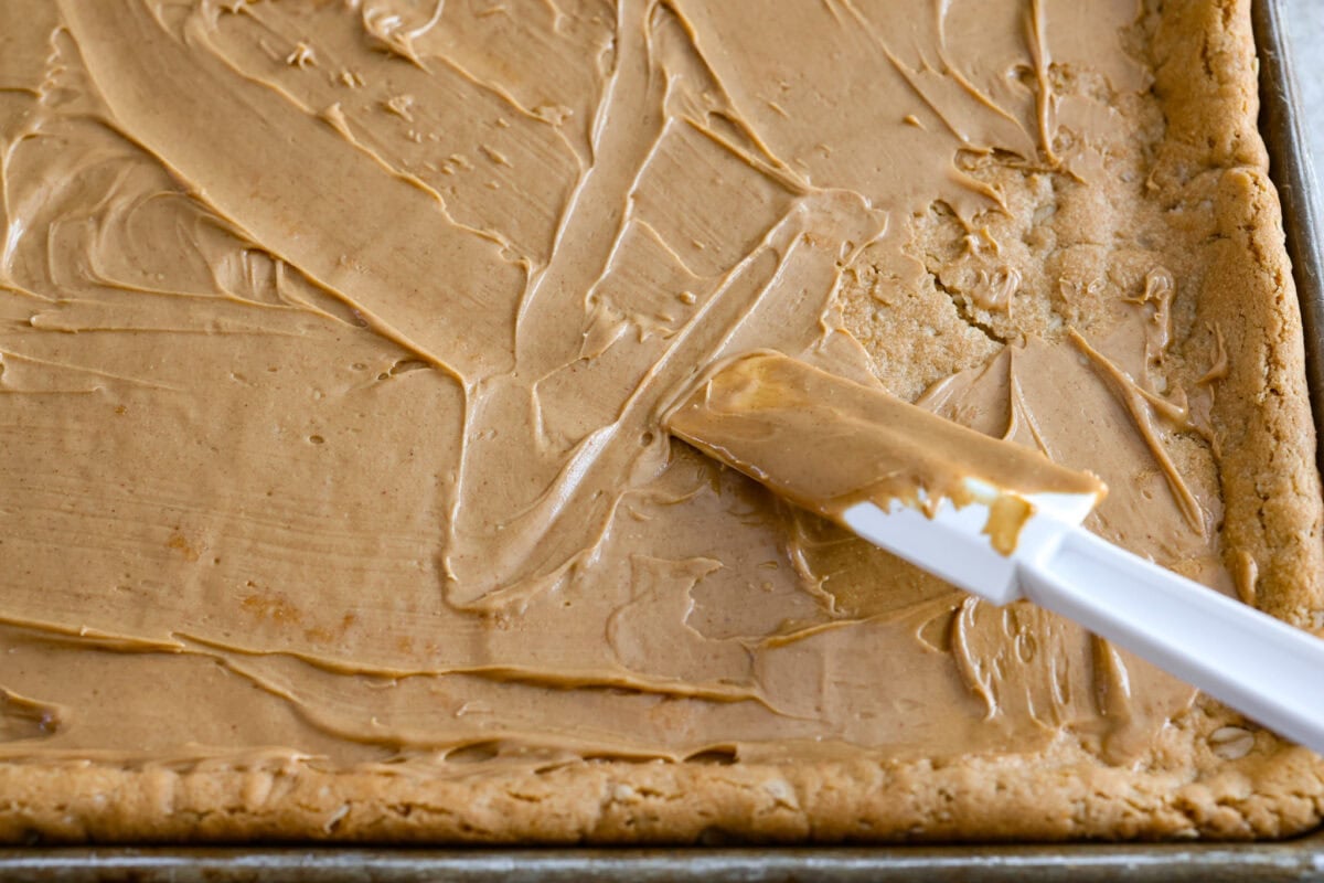 Peanut butter spread and layered onto the cookie bar.